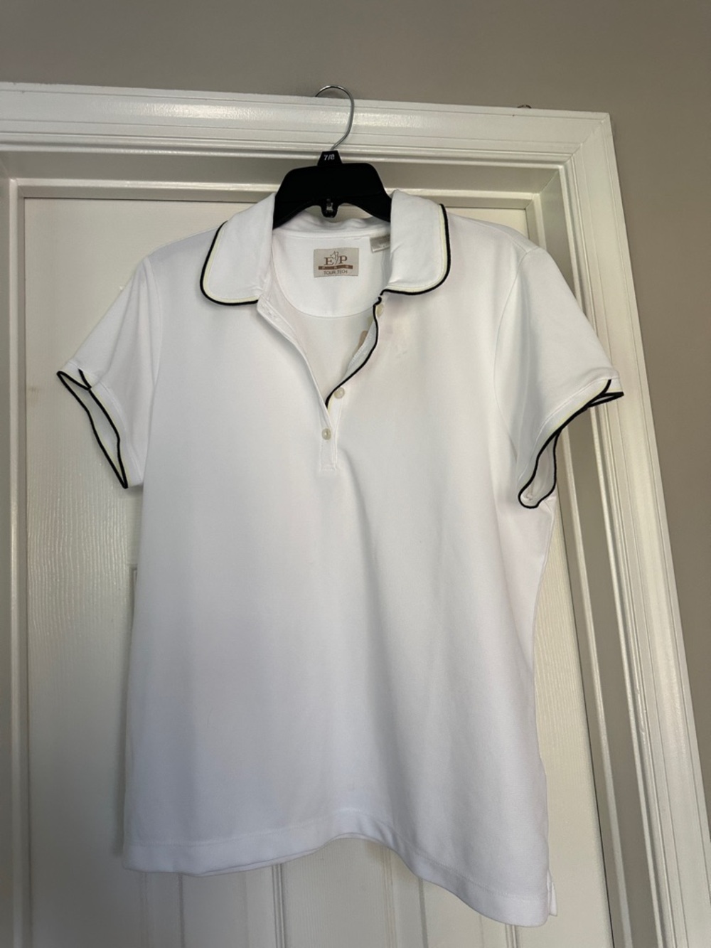 EP pro golf polo.